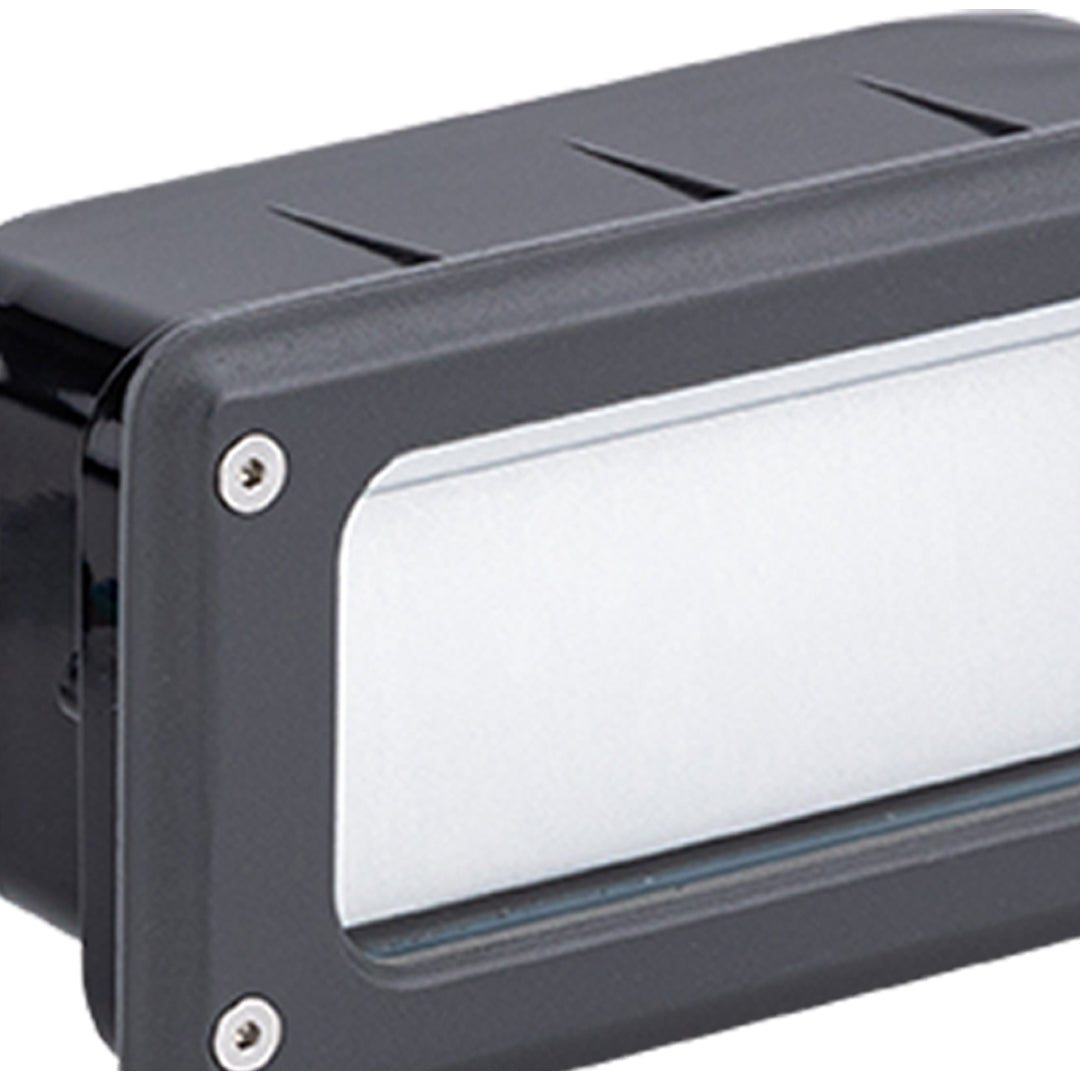Black rectangular recessed fixture with frosted white lens and robust weatherproof construction