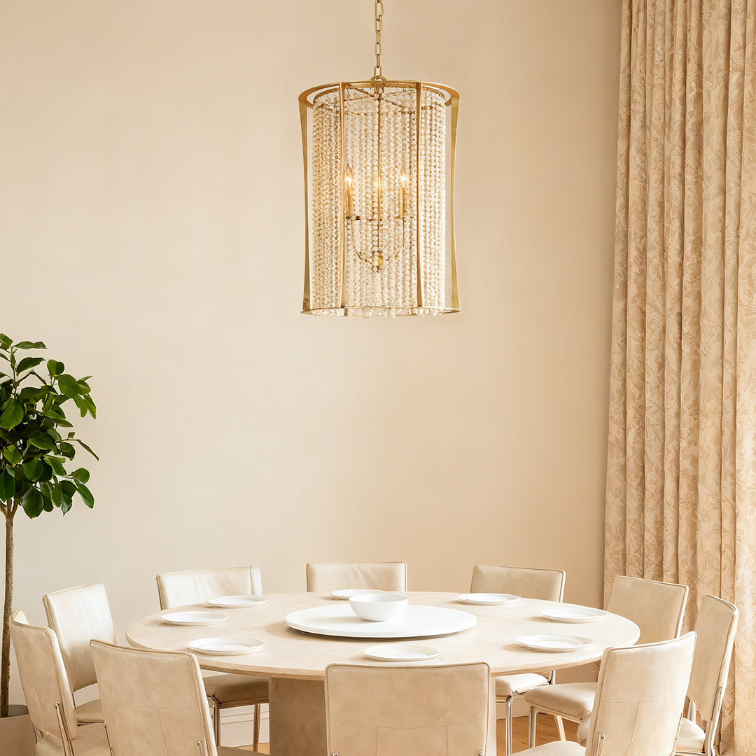 Elegant wood beaded chandelier with gold frame in a sophisticated dining area