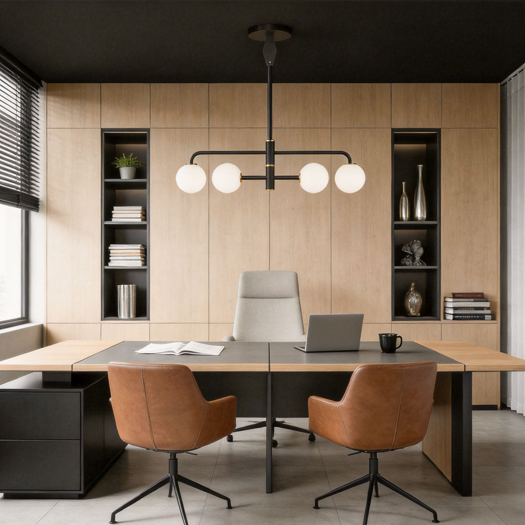 Black semi flush mount light mounted above a wood desk in a modern home office with built-in shelving.