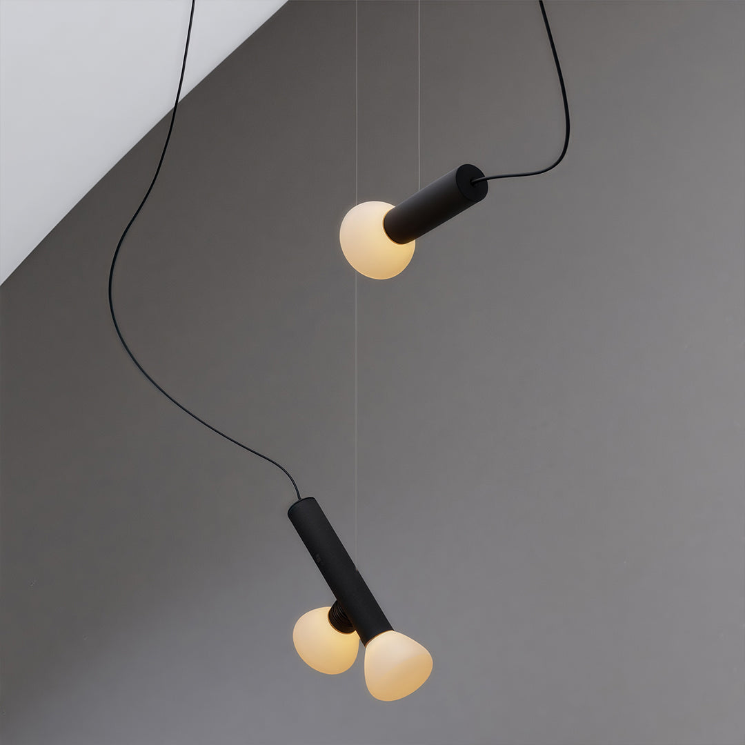 Black small pendant light with three bulbs, minimalist and stylish ceiling lighting solution