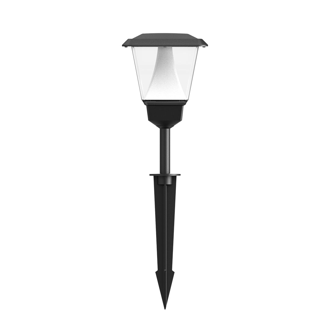 Black solar garden light with white lantern head and ground stake for outdoor pathway illumination