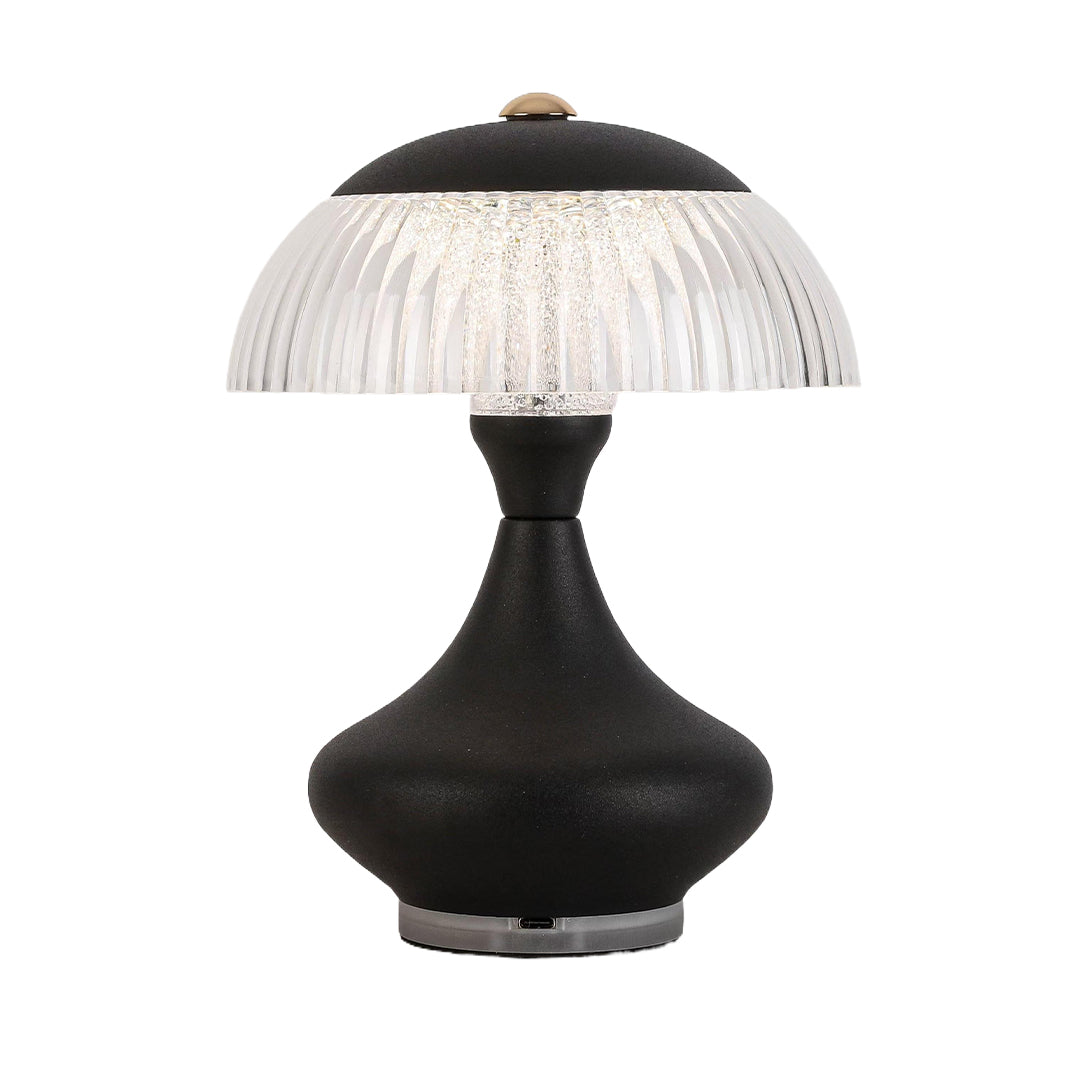 Black speckled finish table unique lamps contrasting with the brightly lit, mushroom-style acrylic shade.