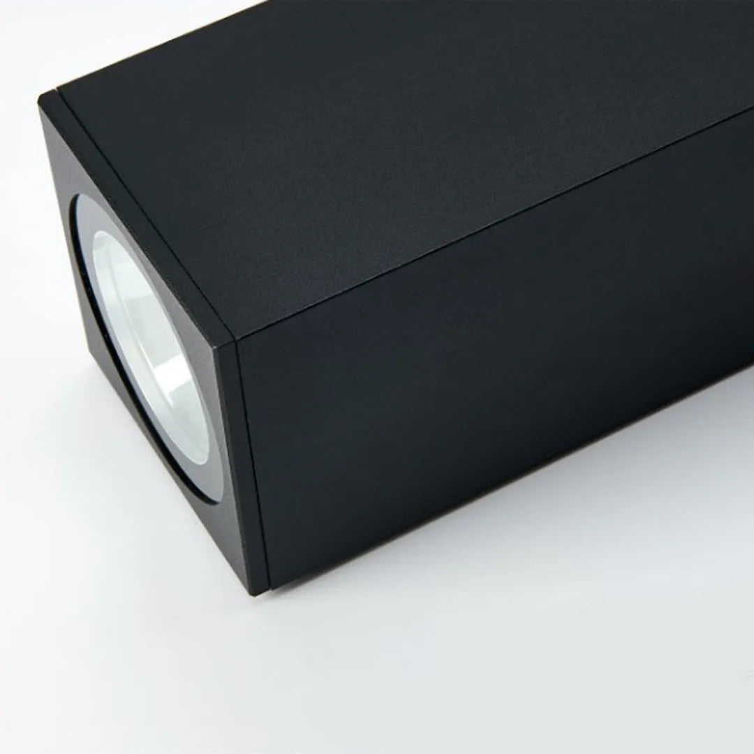 Black square outdoor up and down wall light angled product view