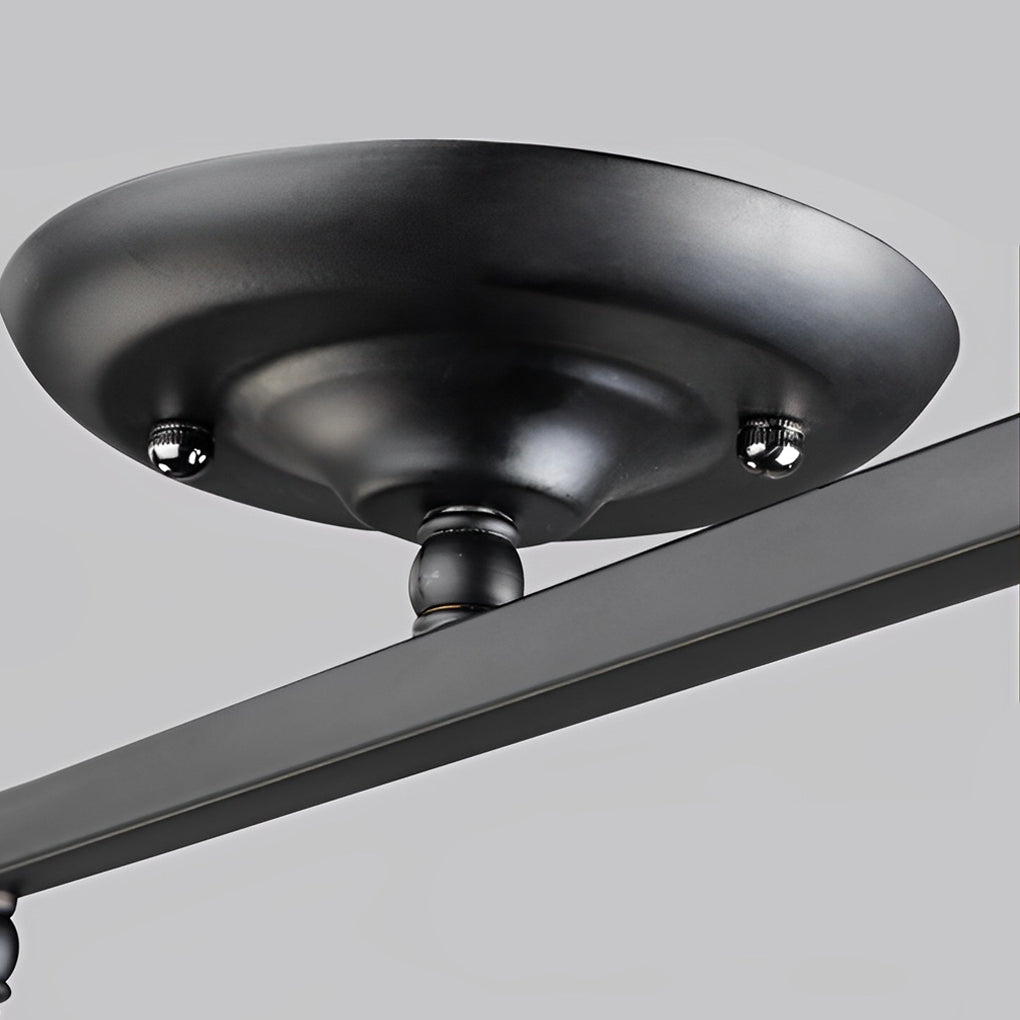 Black track light ceiling mount, highlighting its sleek and functional design.