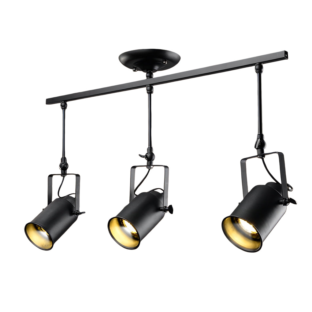 Black track light system with three adjustable spotlights, mounted on a track.