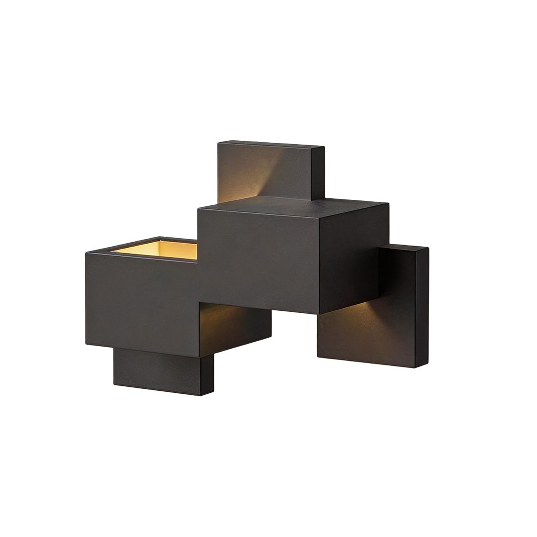 Black up down wall lights with a geometric design, enhancing a modern exterior.