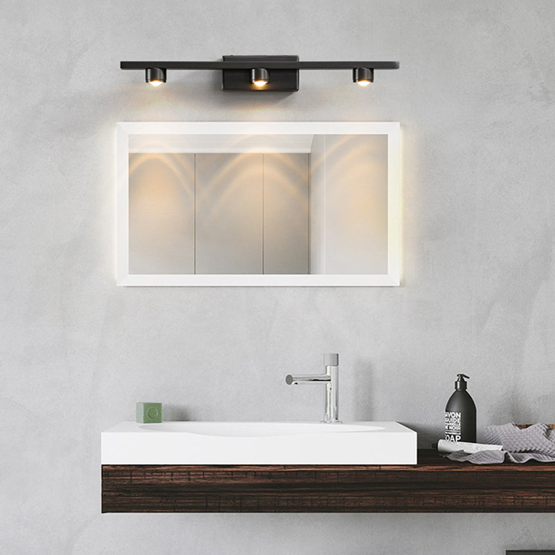 Black vanity lights for bathroom creating ambient wall lighting with multiple warm spotlights