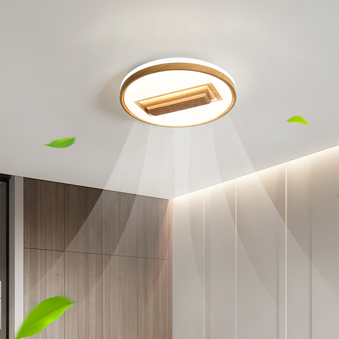 Bladeless ceiling fan with LED light in contemporary space with circular design creating comfortable air flow and illumination