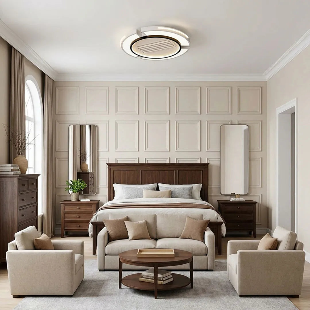 Bladeless ceiling fan with lighting installed in a bedroom with a sleek circular ceiling fixture.