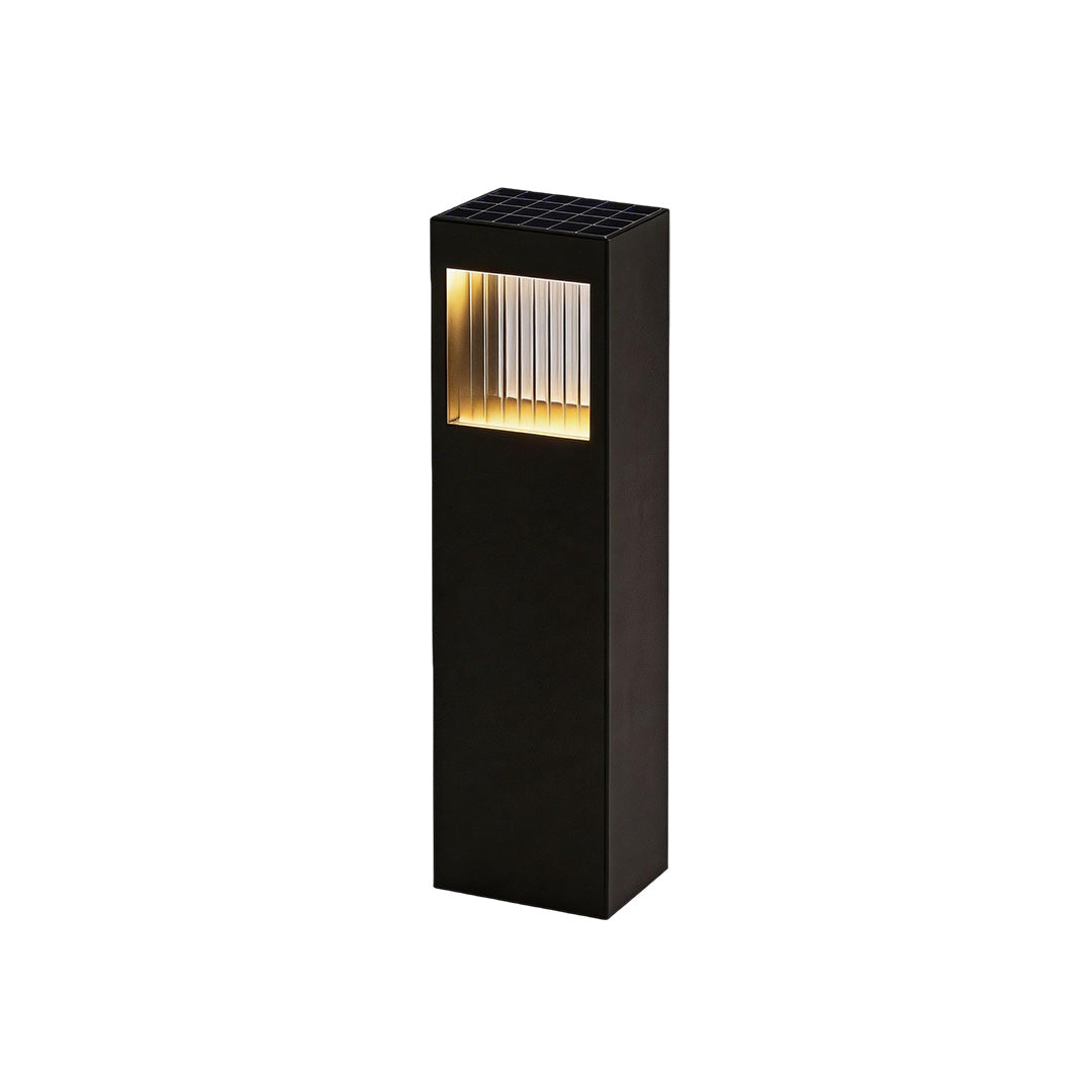 Bollard garden lights with a modern rectangular design, enhancing a patio.