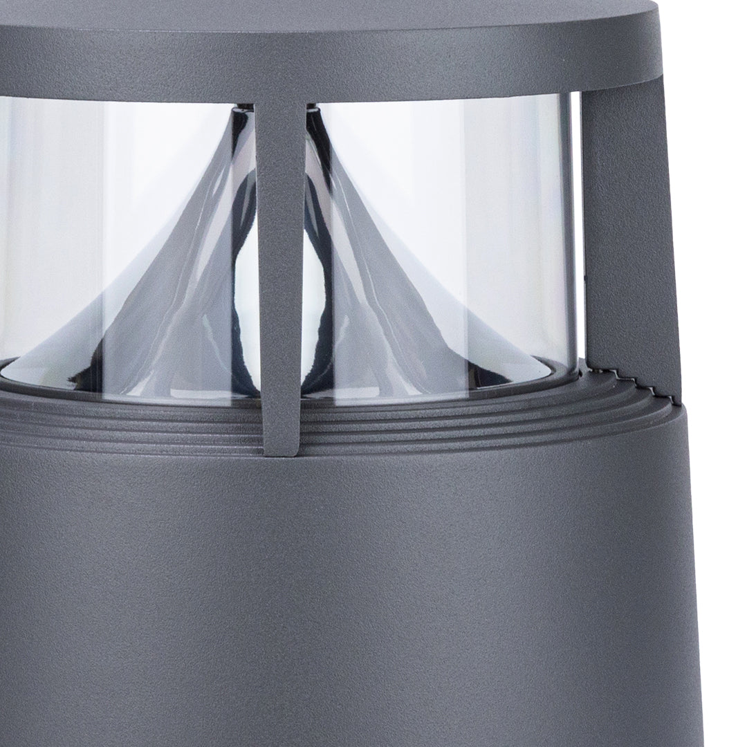 Close-up detail of bollard light internal mechanism showing decorative metalwork and LED components