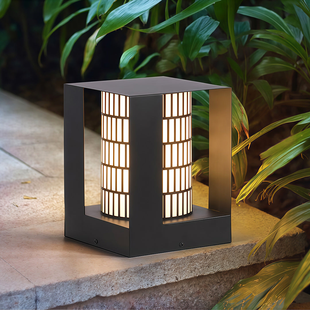 LED bollard landscape light illuminating a garden path with soft ambient light, perfect for decorative outdoor lighting.