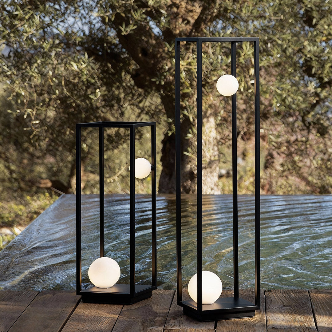Bollard lighting along a pathway, offering stylish illumination for evening outdoor gatherings.