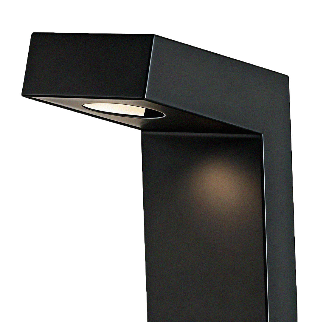 Bollard path light from a side angle, emphasizing its modern and compact structure.