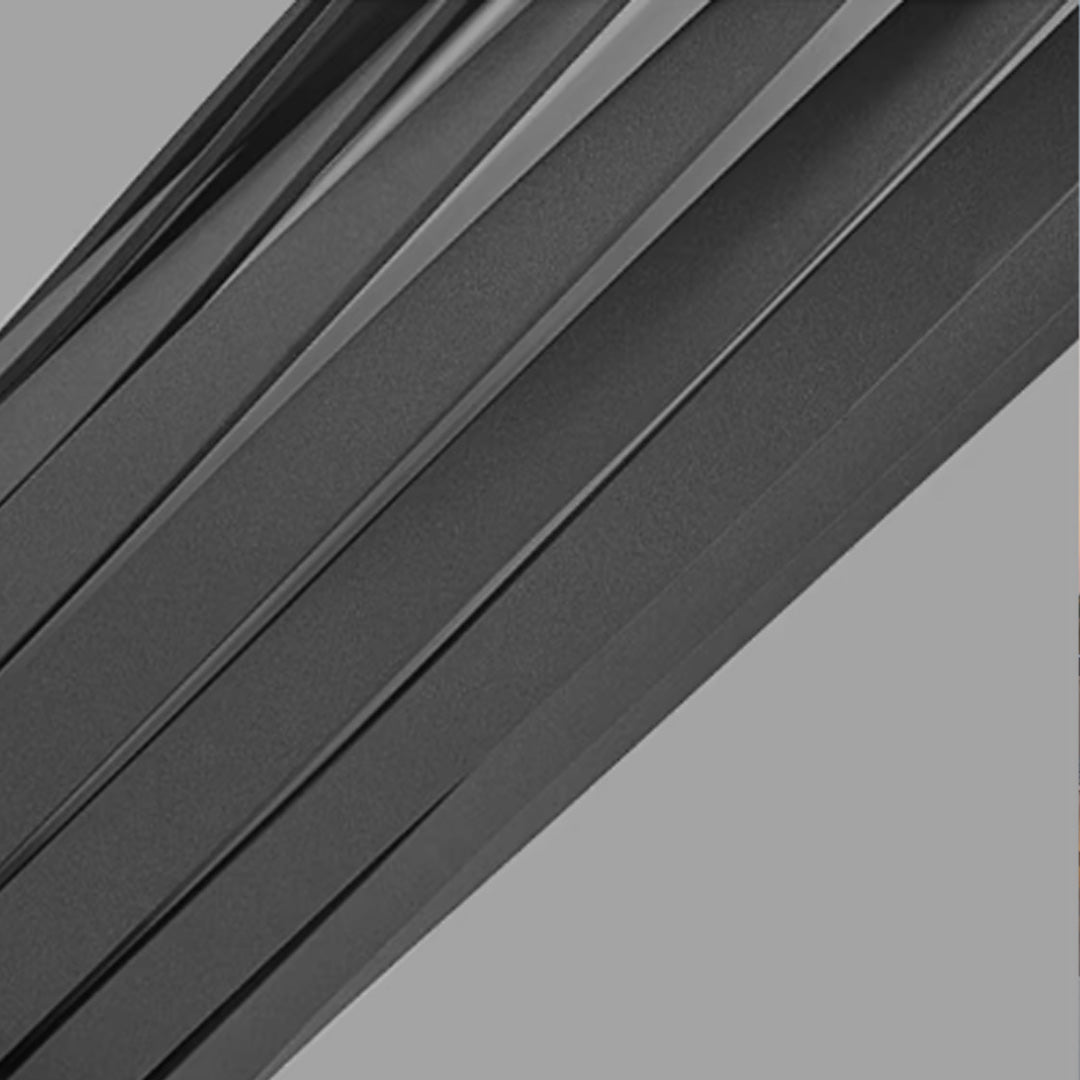 Close-up detail of bollard path light surface showing vertical groove design.