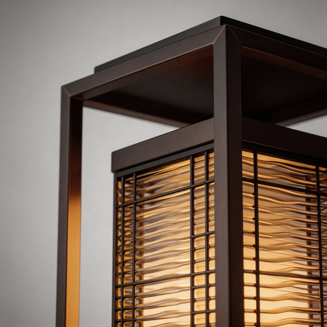 Bollard pathway lighting with a solar panel, providing soft illumination.