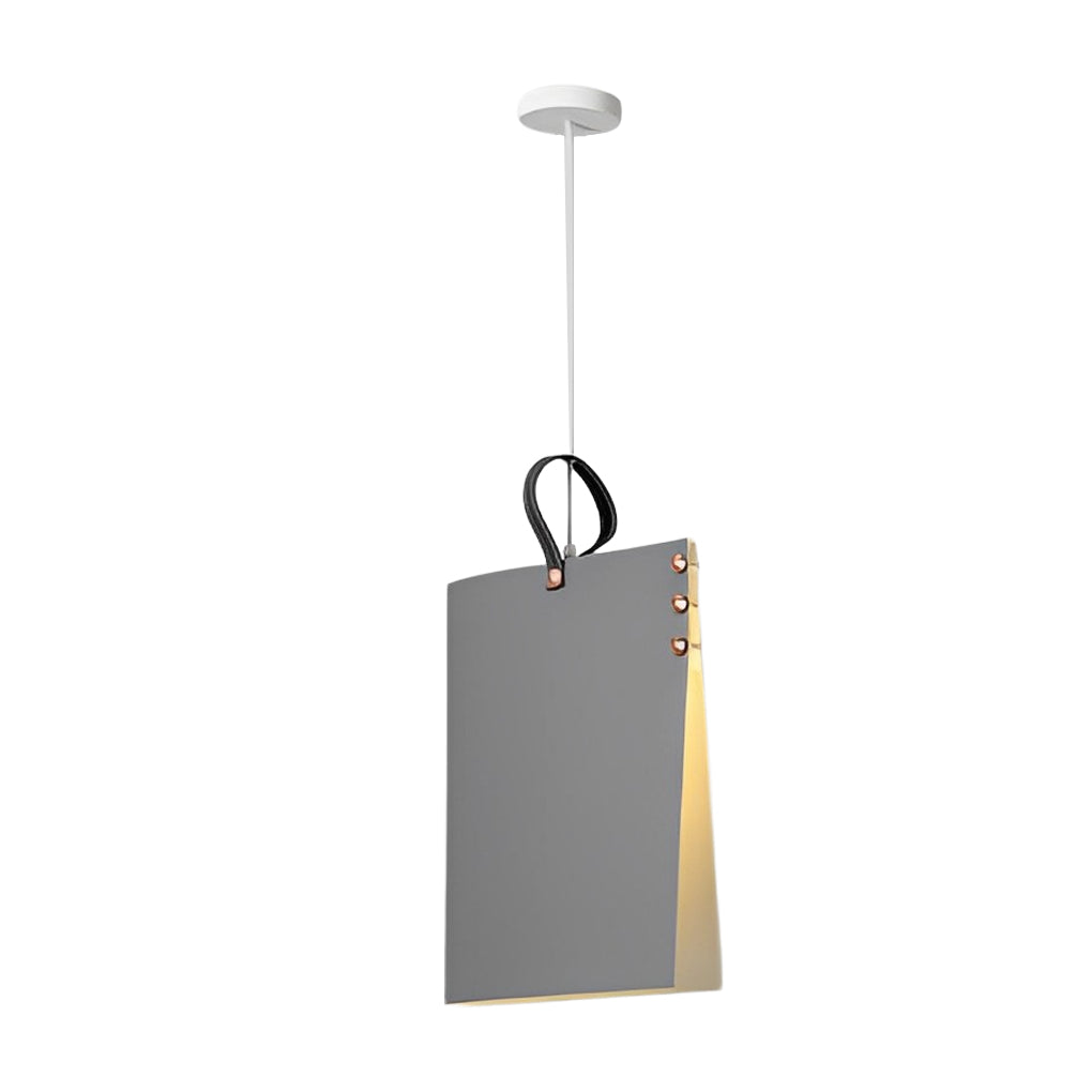 Vertical book pendant light in dark finish, highlighting hanging loop detail and warm inner glow.