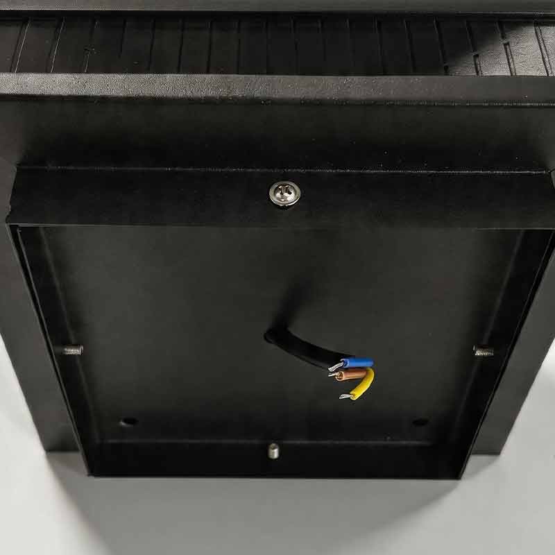 Bottom view of square outdoor pillar light showing electrical wiring for garden installation.