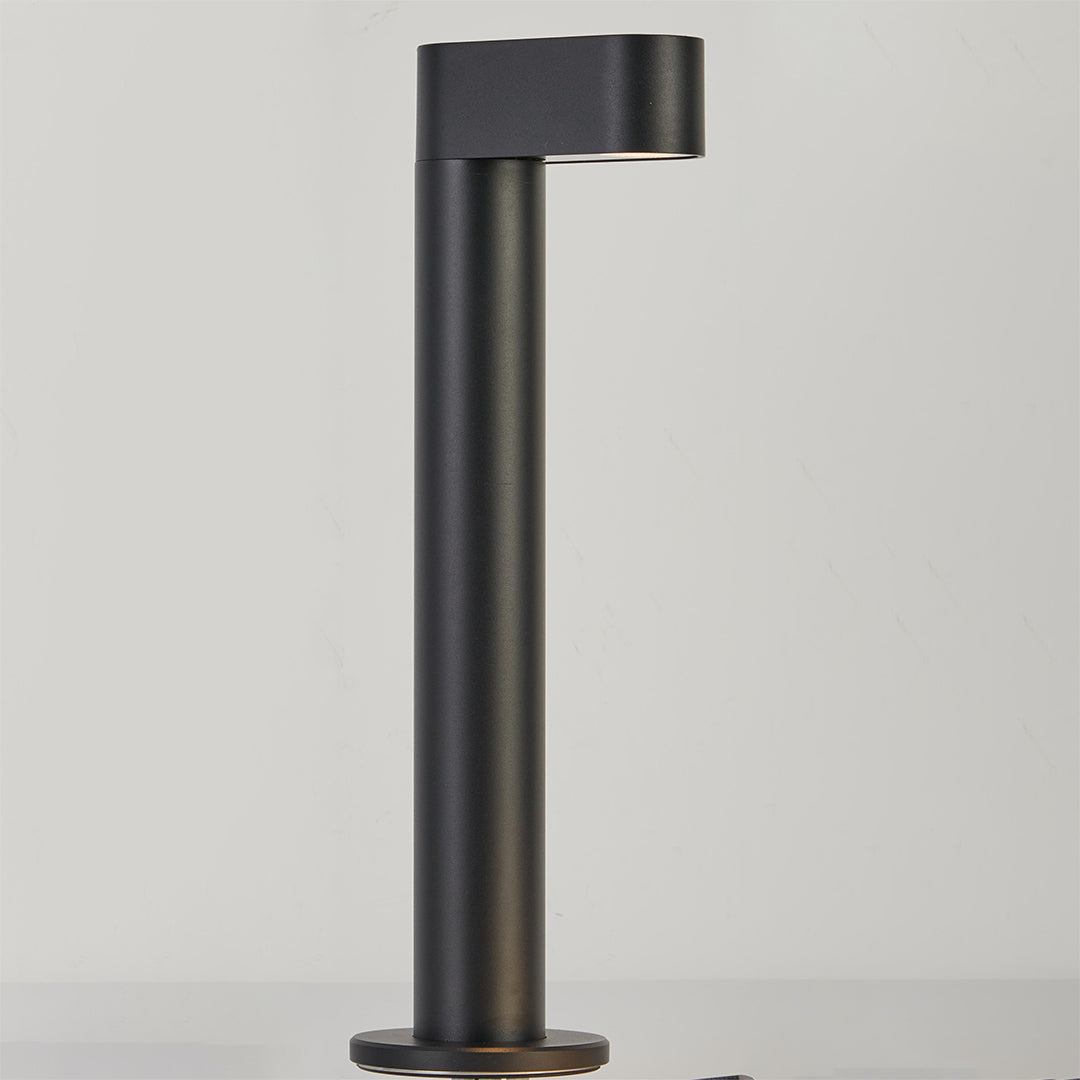 Modern black LED path light with horizontal mounting bracket for versatile outdoor installation