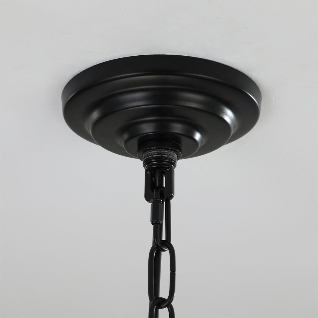 Industrial vintage pendant light with brass accents, blending vintage charm with modern sophistication.