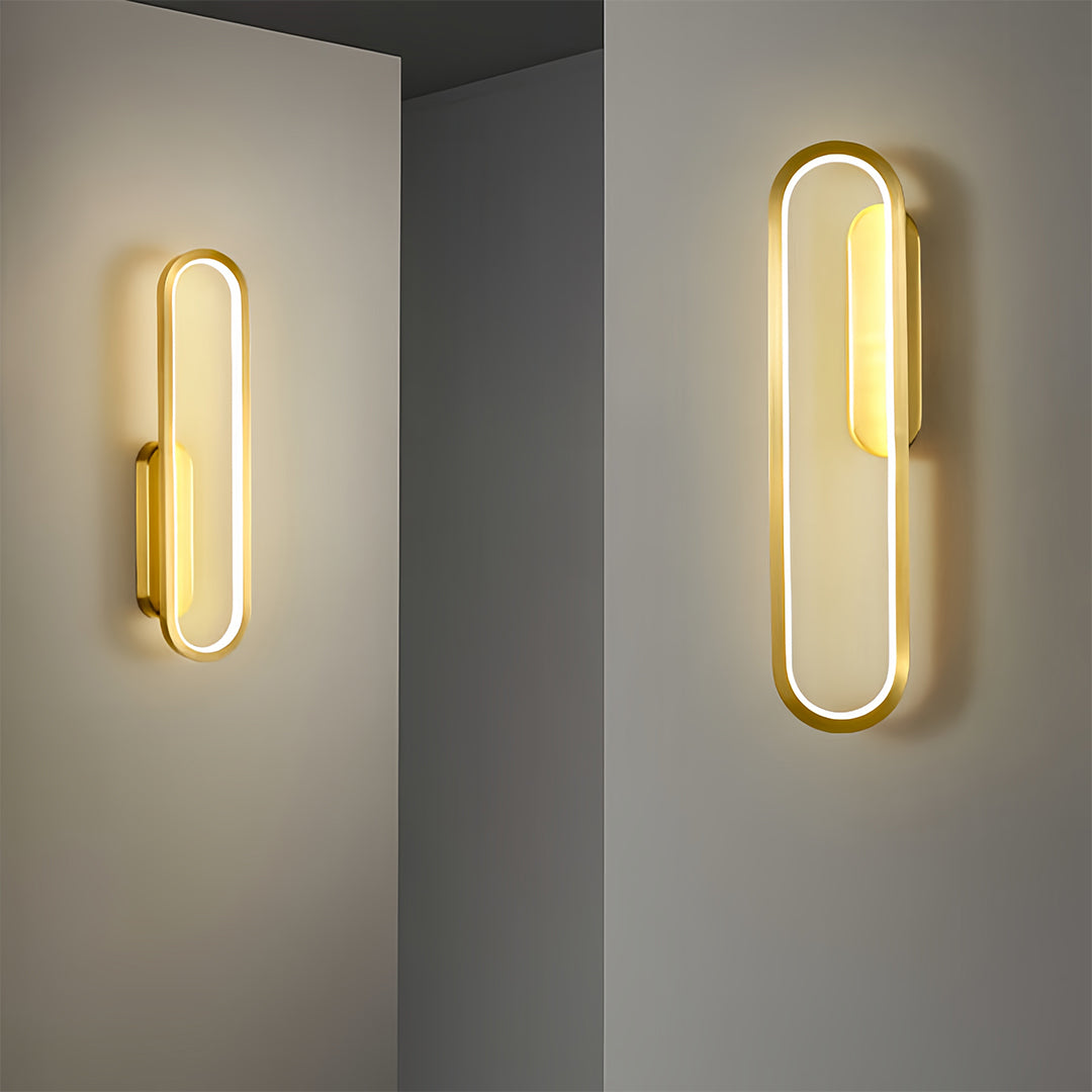 Professional wall pack LED light with brass accents illuminating modern corridor space