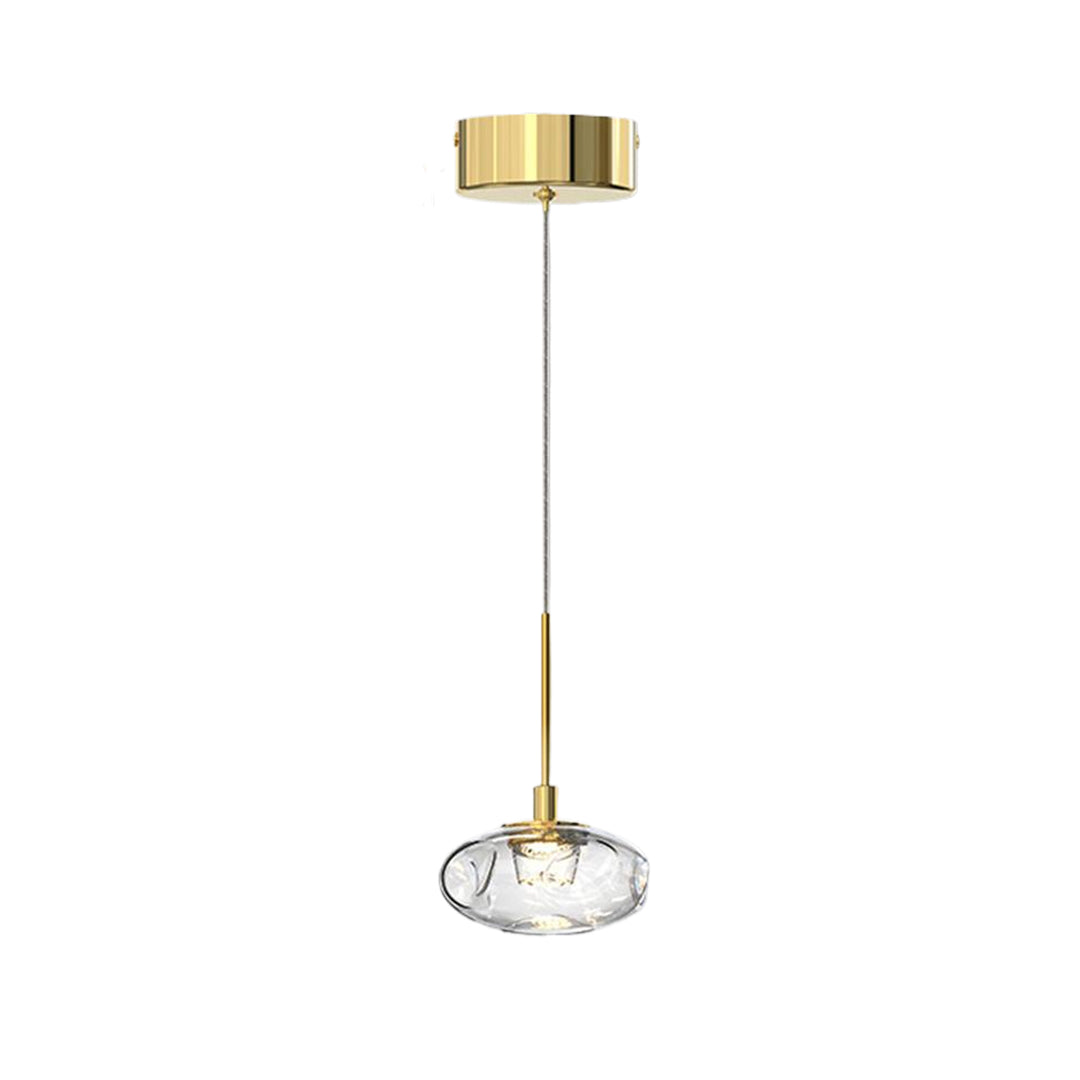 Contemporary small glass pendant lights with brass accents showcasing cut glass shade in warm golden tone