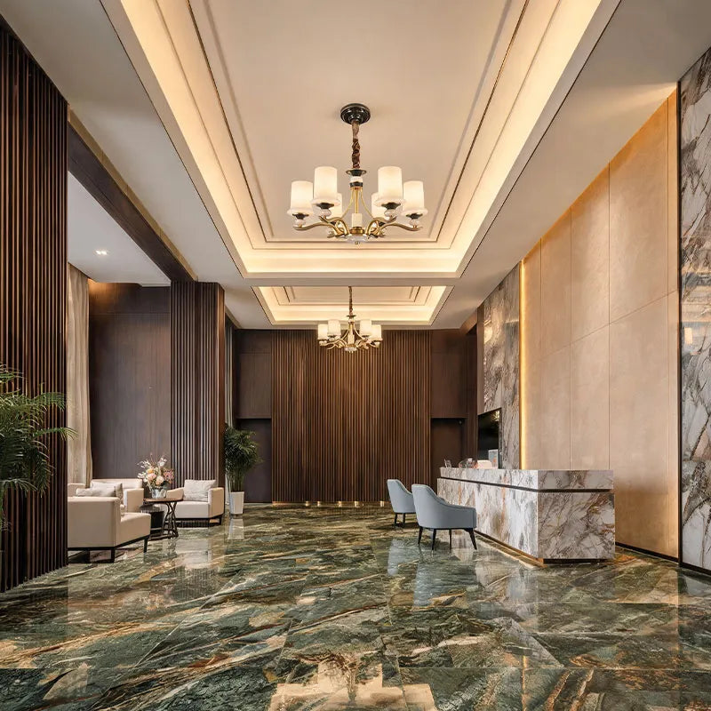 Brass candle chandelier illuminating a modern hallway with a classic multi-light design.
