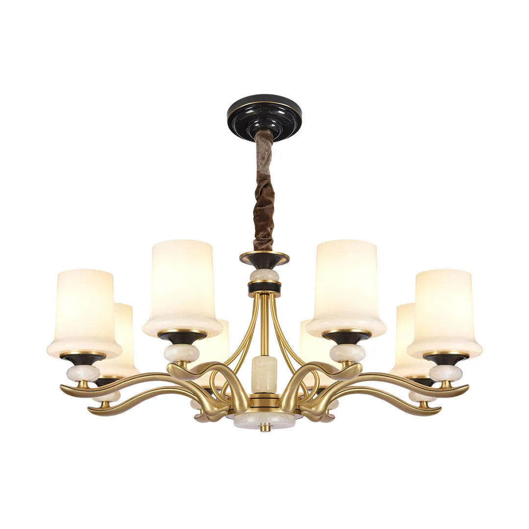 Brass candle chandelier featuring a symmetrical multi-light design with curved brass arms.