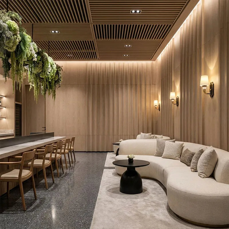 Brass candle sconces wall lighting a luxury dining and living space with warm ambient illumination.