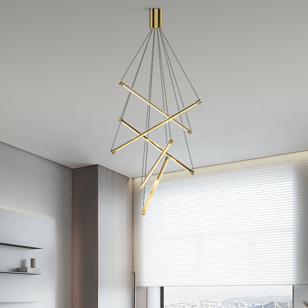 Contemporary LED linear chandelier with brass elements creating warm ambient lighting in modern room