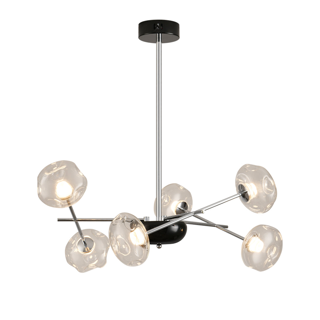 Contemporary LED chandelier lights with brass finish featuring six glass globe bulbs in branching design