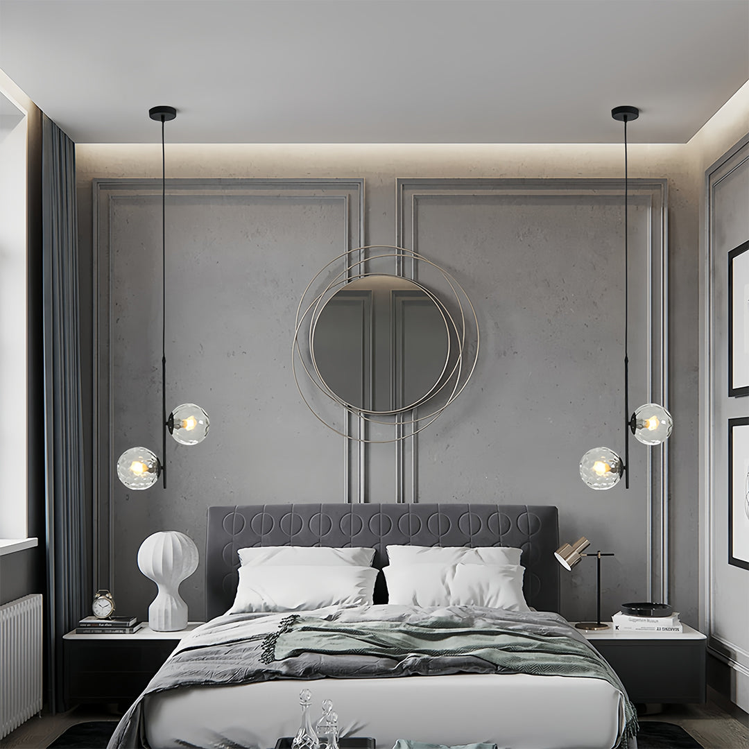 Brass glass hanging pendant light detail showing premium metallic finish and clear sphere construction quality