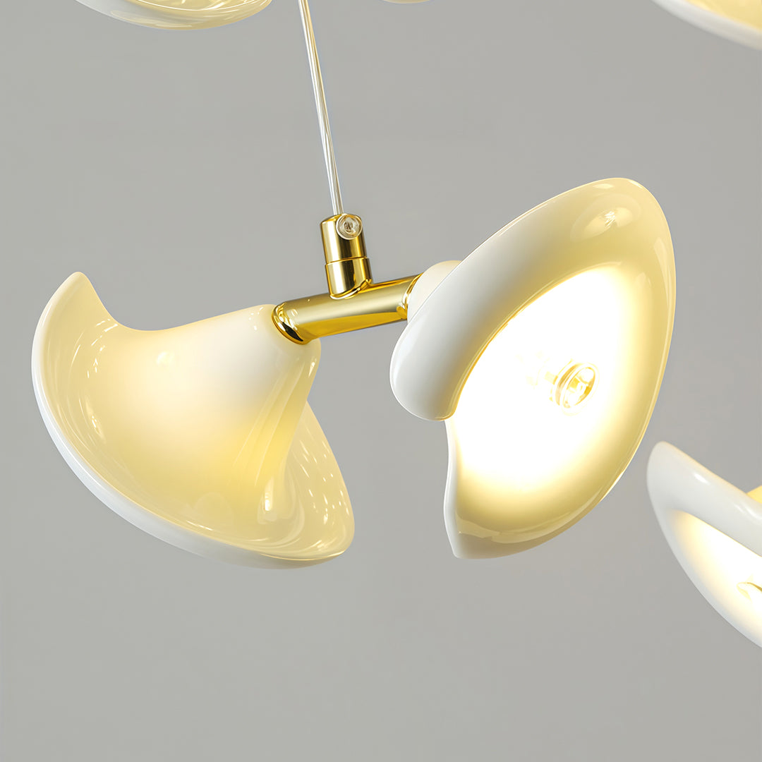 Close up of modern brass ceramic chandeliers light shade in white and gold.