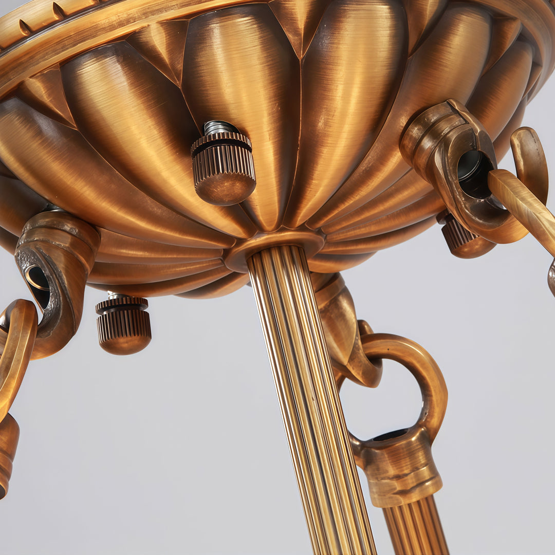 Brass modern chandelier close-up showing decorative brass hardware and premium craftsmanship details.