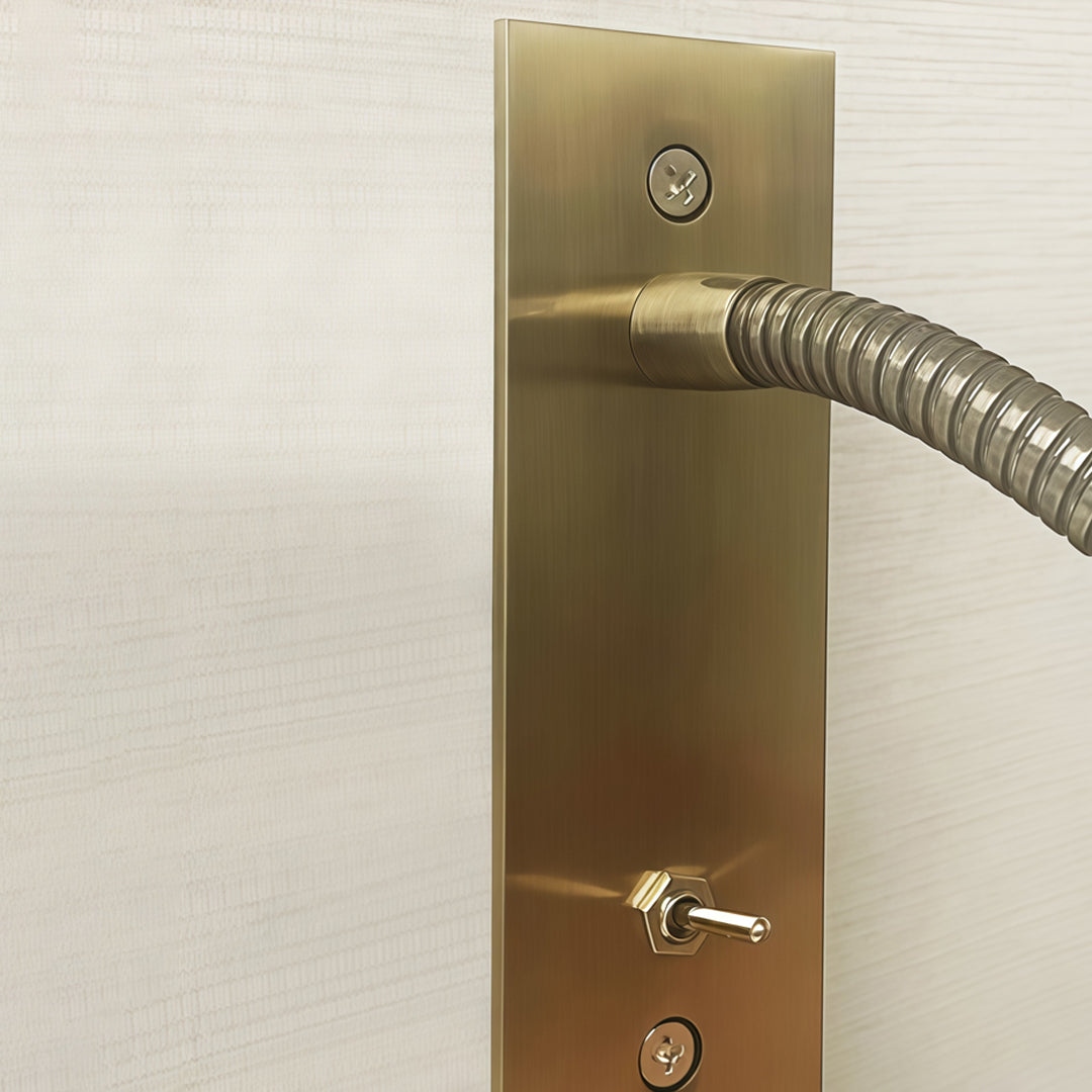 Brass swing arm wall mount light with flexible black reading arm and slim backplate.