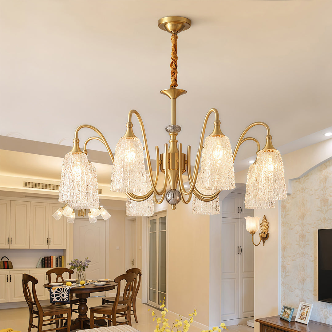 Brass vintage chandelier hanging in a classic dining room, enhancing the space with timeless elegance.
