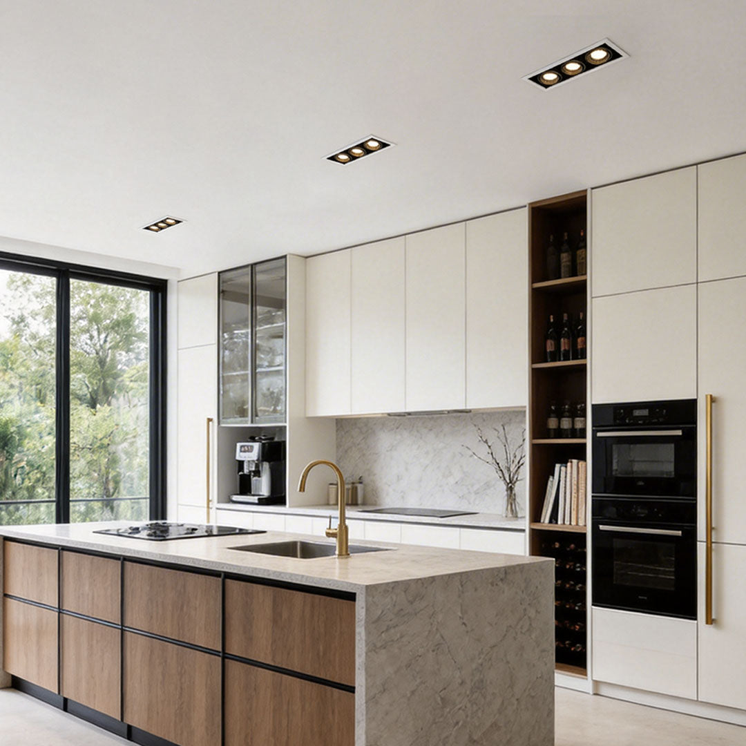 Bright kitchen scene with island and led spotlight indoor highlighting contemporary cabinetry.