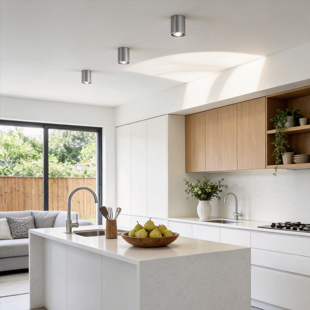 Bright kitchen with surface mount can lights offering clean and even illumination.