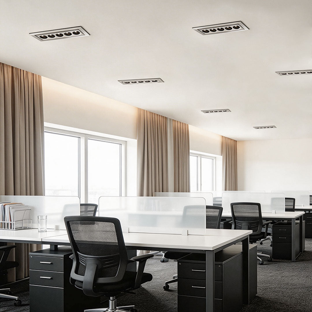 Bright meeting room with led ceiling recessed spotlights providing even lighting.