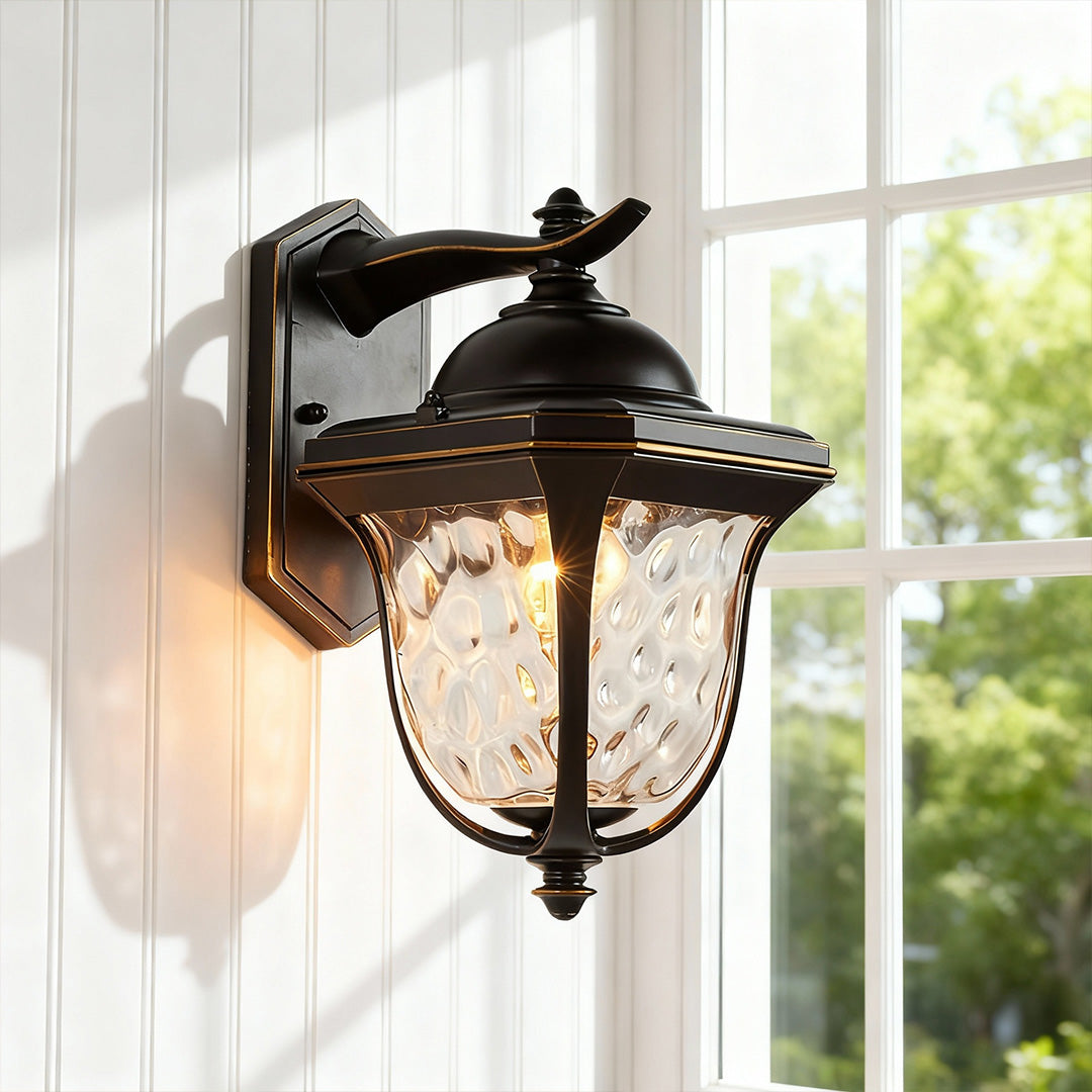 Bright outdoor wall lights mounted indoors near window with seeded glass.