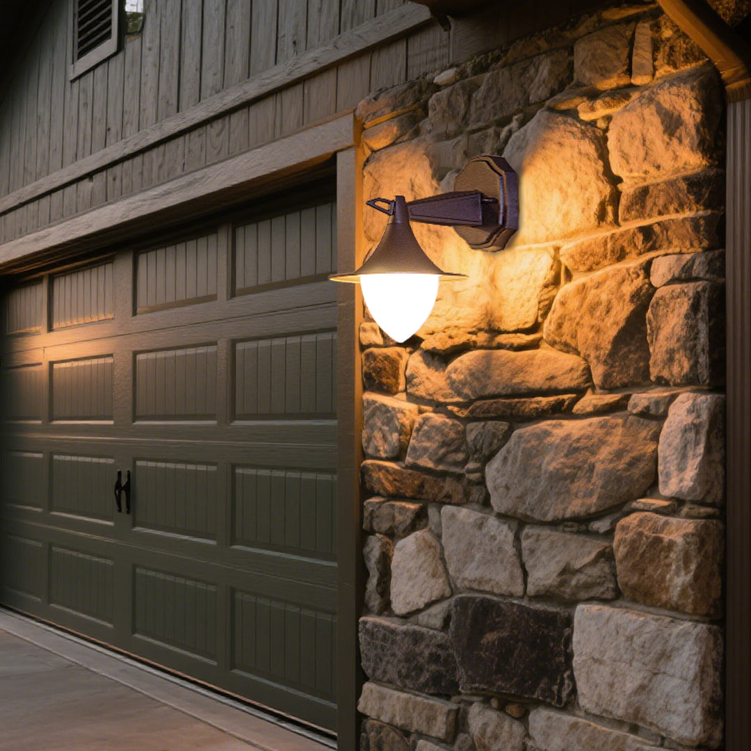 Sophisticated bronze outdoor light with triangular shade and premium architectural finish