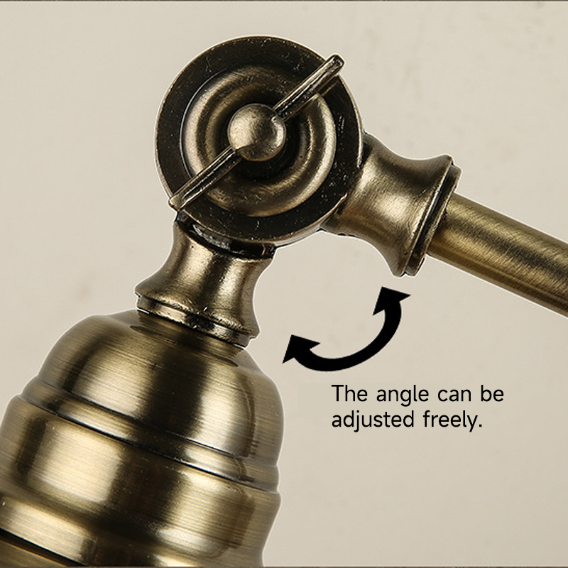 Bronze desk lamp adjustable joint detail showing flexible arm.