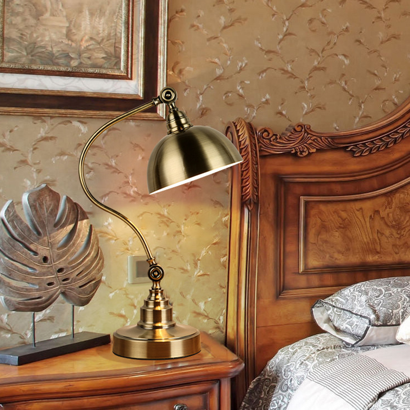 Bronze desk lamp styled on a vintage bedside table.
