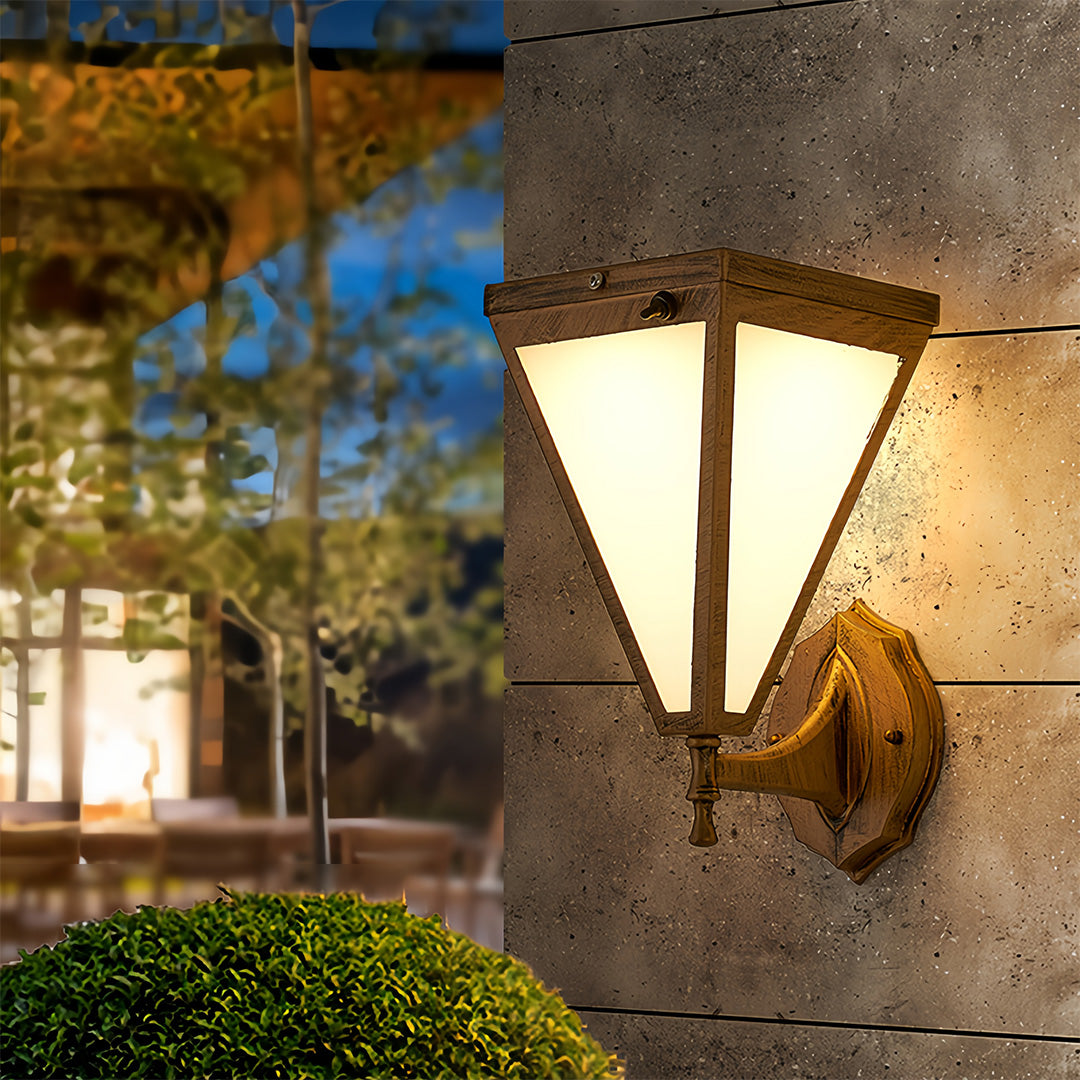 Outdoor solar lights wall mounted in rustic bronze finish on outdoor wall.