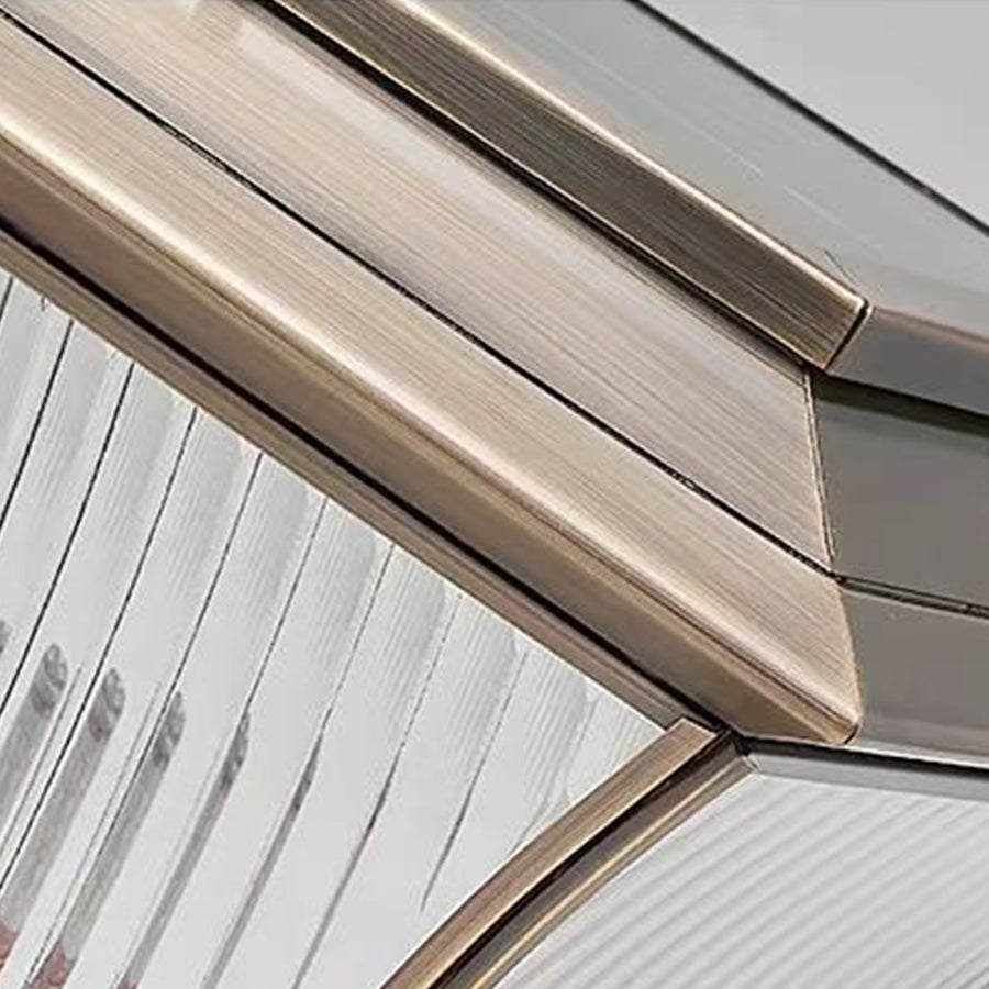 Close-up detail of bronze lamp base showing layered metalwork and precision craftsmanship