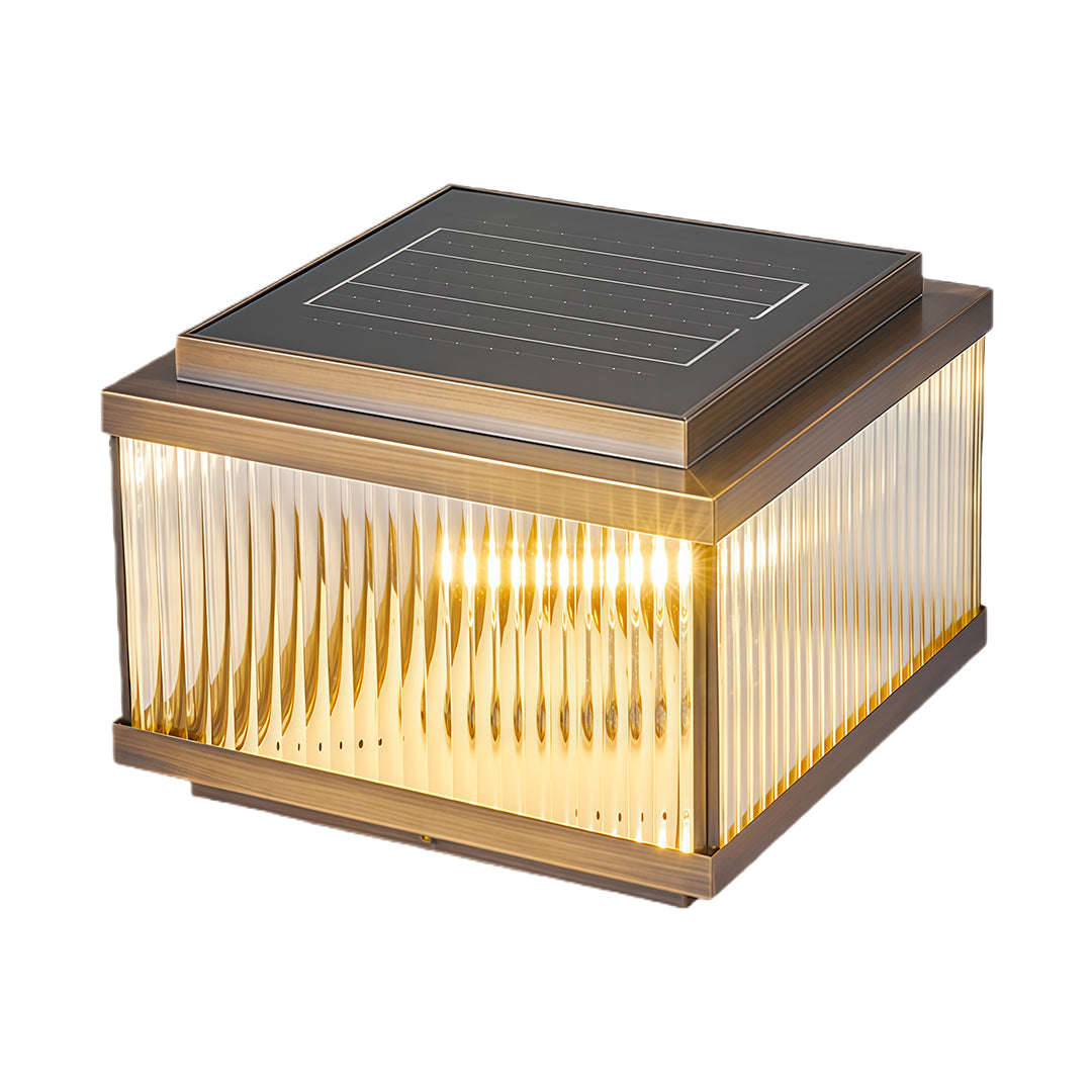 Square copper pillar light with warm LED illumination and textured corrugated glass panels on dark bronze frame
