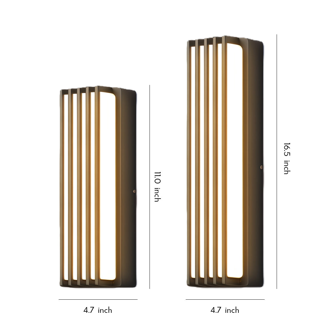 Vertical bronze wall-mounted linear lighting fixture with slim ribbed design, shown as a standalone product.