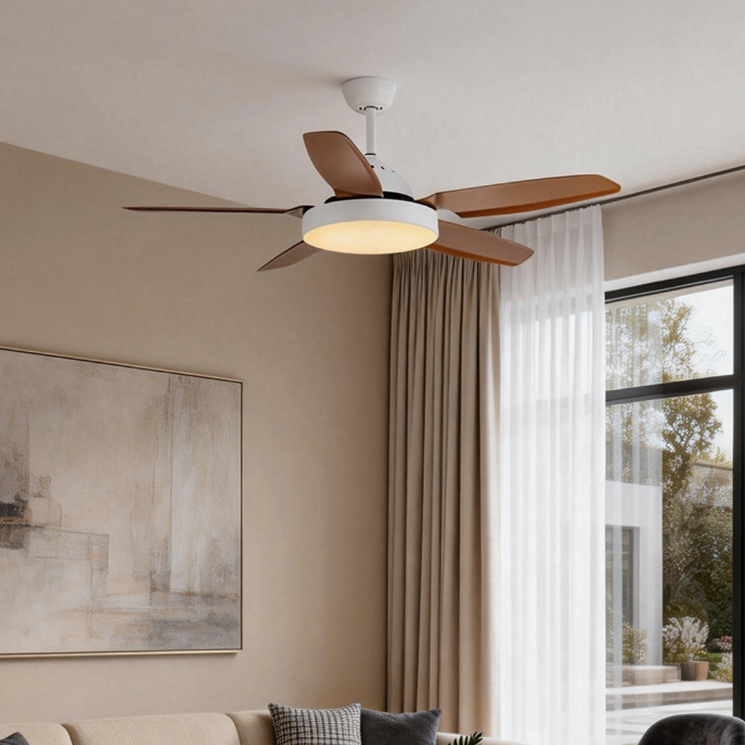 Brown ceiling fan with light adding warmth to a modern bedroom with large windows.