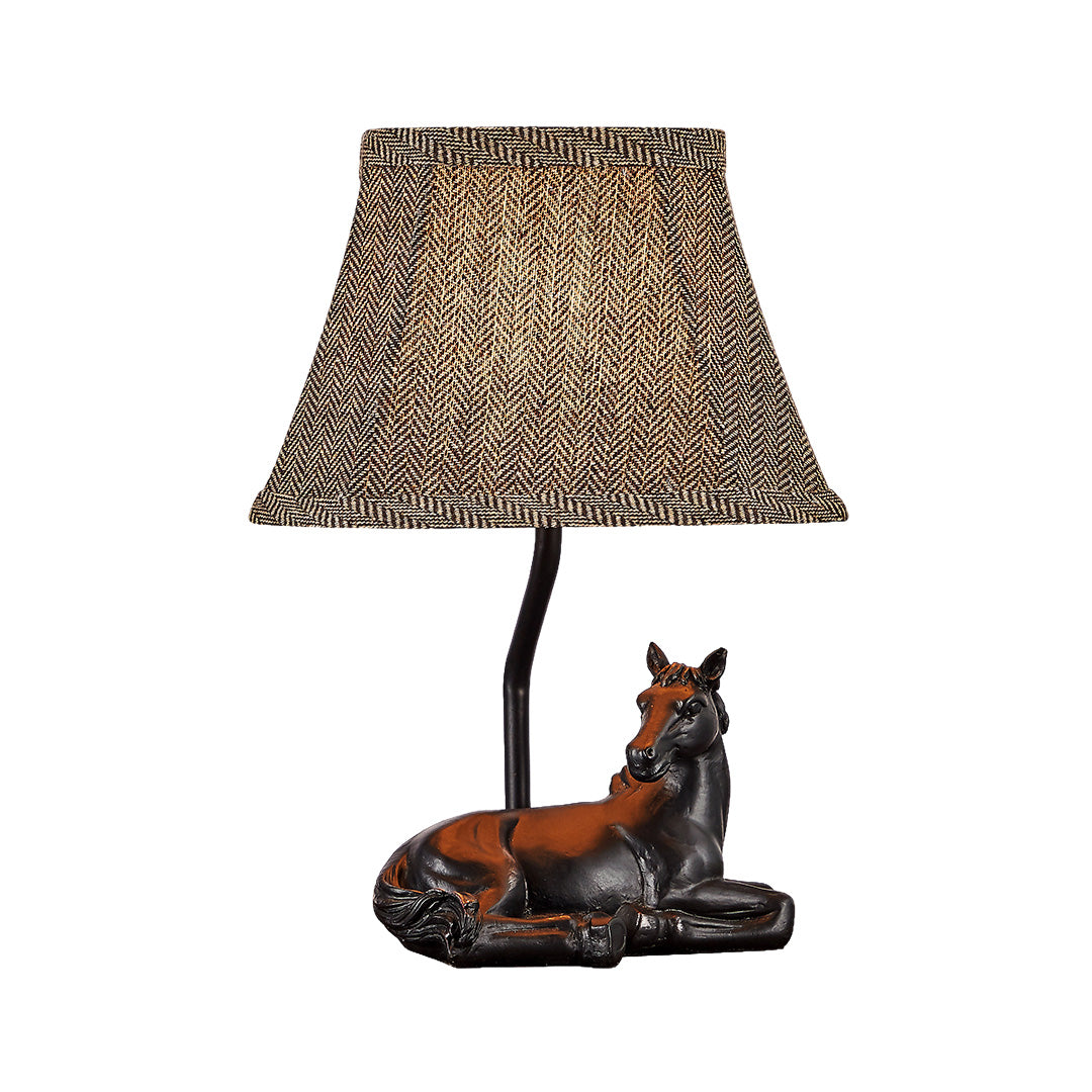 Product view of the table lamp horse with a brown/reddish resin finish, showing the unique horse sculpture detail and patterned shade.