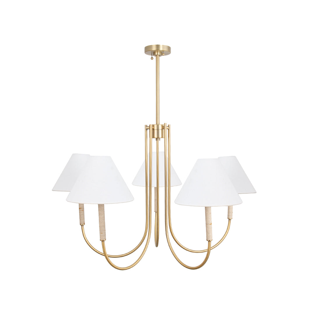 Studio shot of the brushed brass cloth shade chandelier with gently curved arms and clean white fabric shades.
